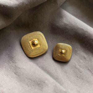 Haute couture knoop goud