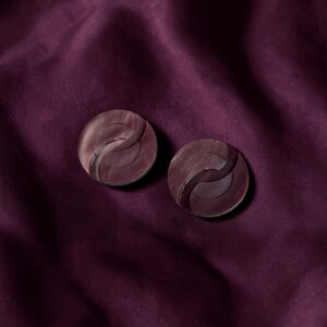 Sculpturale vintage knoop – aubergine paars | grafisch design